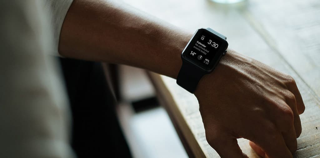 Close up of a man's wrist and a digital watch